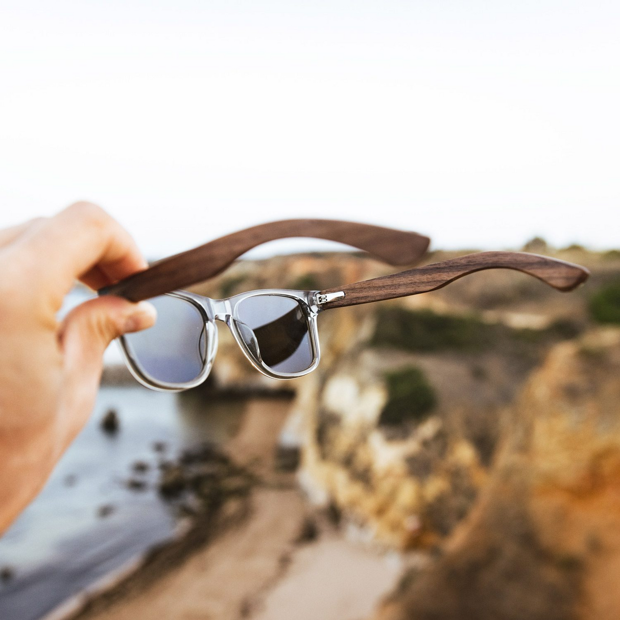 Walnut wood classic style sunglasses with semi-transparent grey frame and black polarized lenses