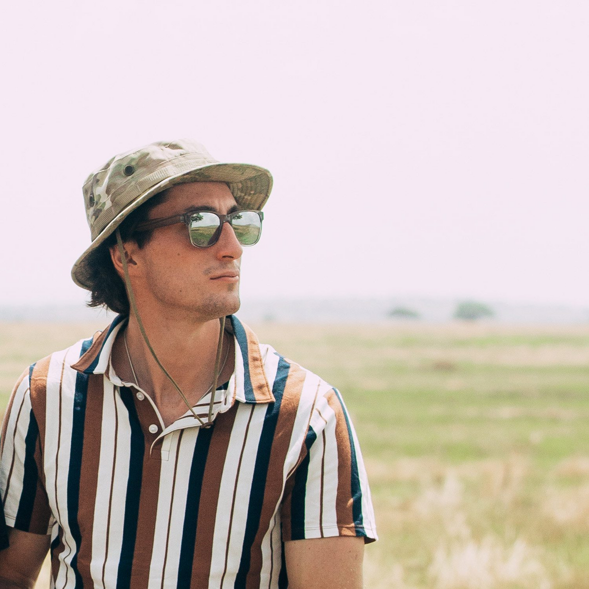 Walnut wood classic style sunglasses with semi-transparent grey frame and silver mirrored polarized lenses