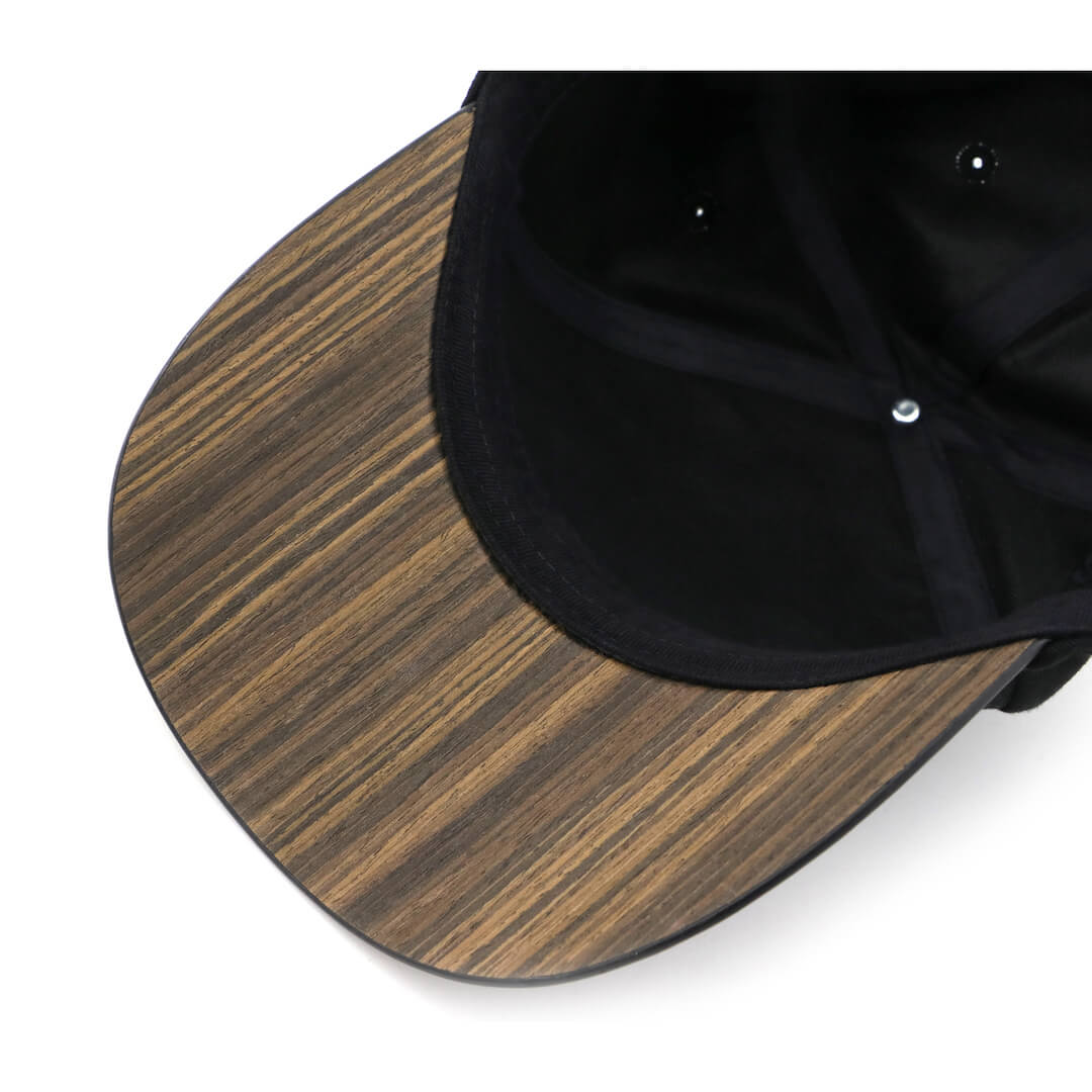 Curved brim baseball style caps made with a real wood brim