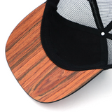 Curved brim baseball style mesh cap made with a real wood brim