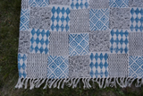 INDIGO DYED HANDWOVEN BLOCK PRINTED COTTON RUG WITH FLORAL DESIGN