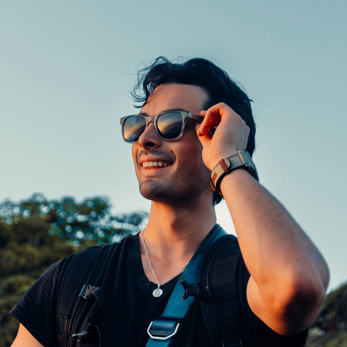 Walnut wood classic style sunglasses with semi-transparent grey frame and black polarized lenses